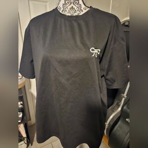 SHEIN Black Tee with Embroidered Accent